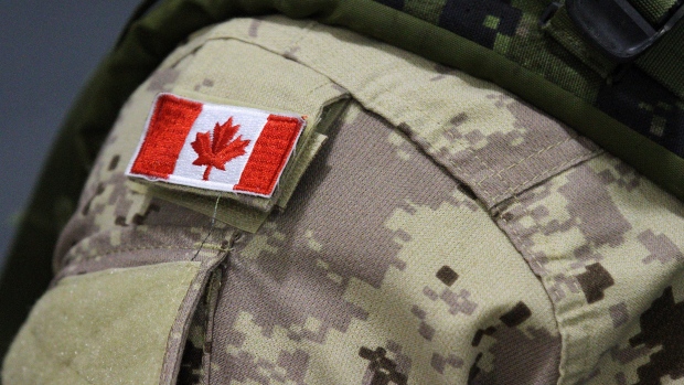 canadian army insignia with flag